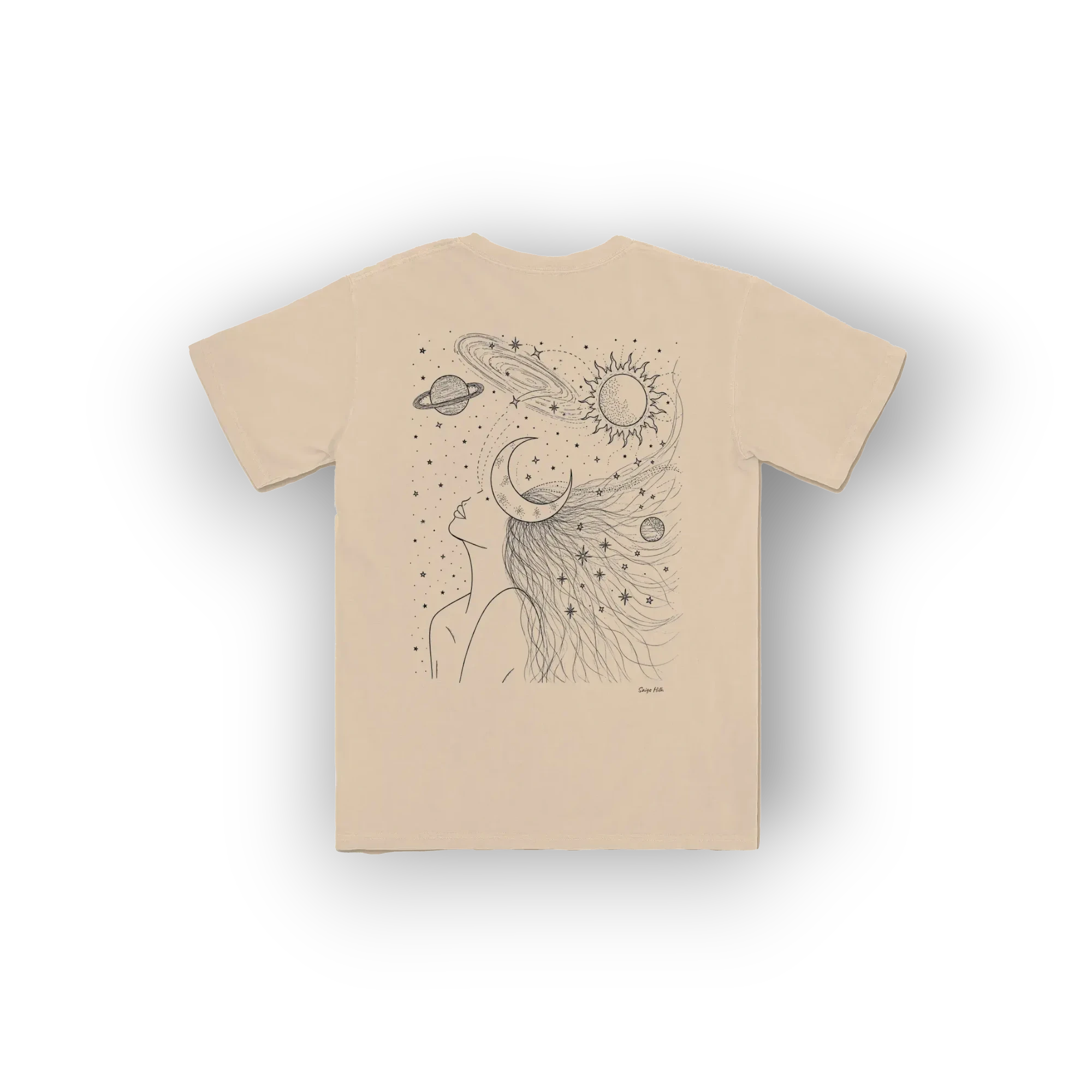 A beige short-sleeve t-shirt with a black line art graphic of a woman's profile with celestial elements like a sun, moon, and planets in her hair, shown on a white background.