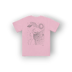 A light pink short-sleeve t-shirt with a black line art graphic of a woman's profile looking up at a crescent moon and a sun with planets, shown against a plain white background.