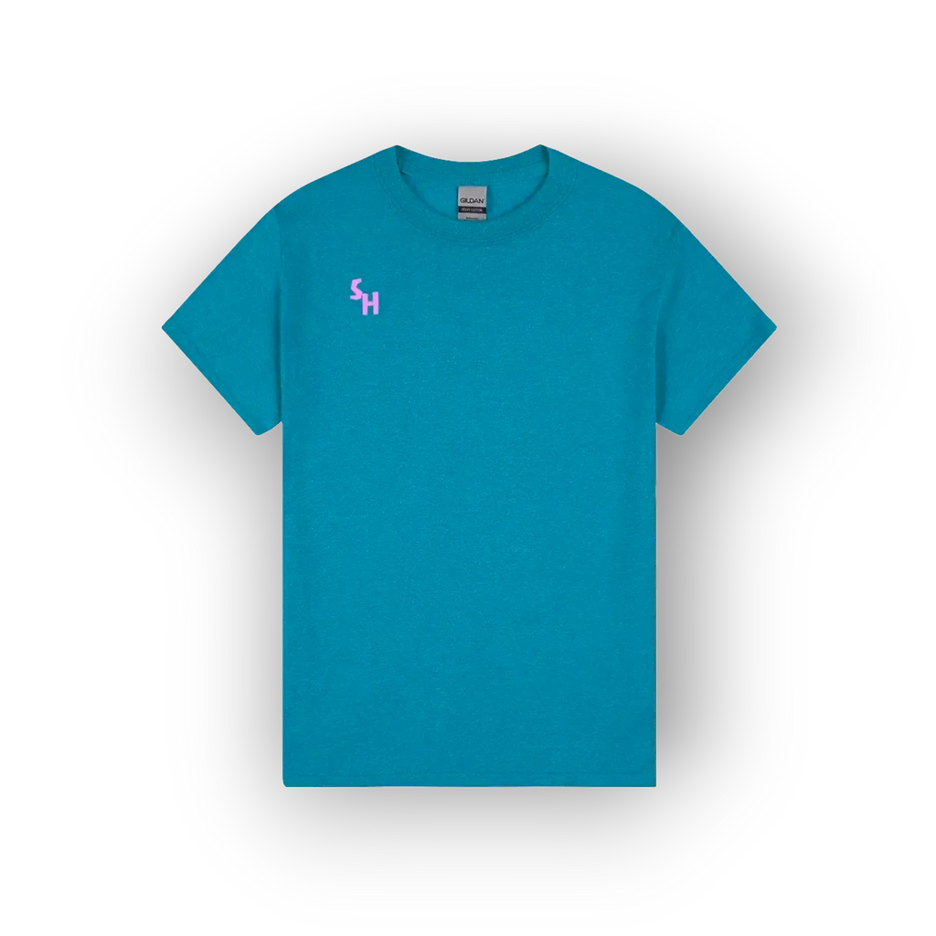 A teal blue short-sleeve crewneck t-shirt with a small pink 'SH' logo on the left chest, displayed on a clean white background with a soft drop shadow.