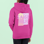A child wearing a bright pink hoodie, shown from the back. The hoodie features a large graphic print on the back with the words 'SAIGE HILH' in stylized pink lettering over pastel yellow, pink, and purple geometric blocks.