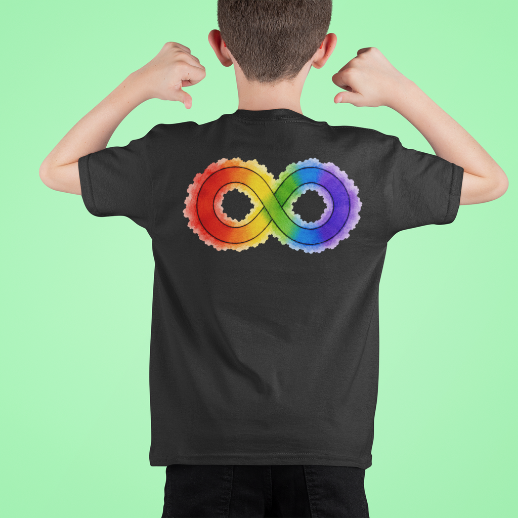 A child viewed from behind wearing a black t-shirt with a large rainbow-coloured infinity symbol printed on the back, posed against a solid light green background.