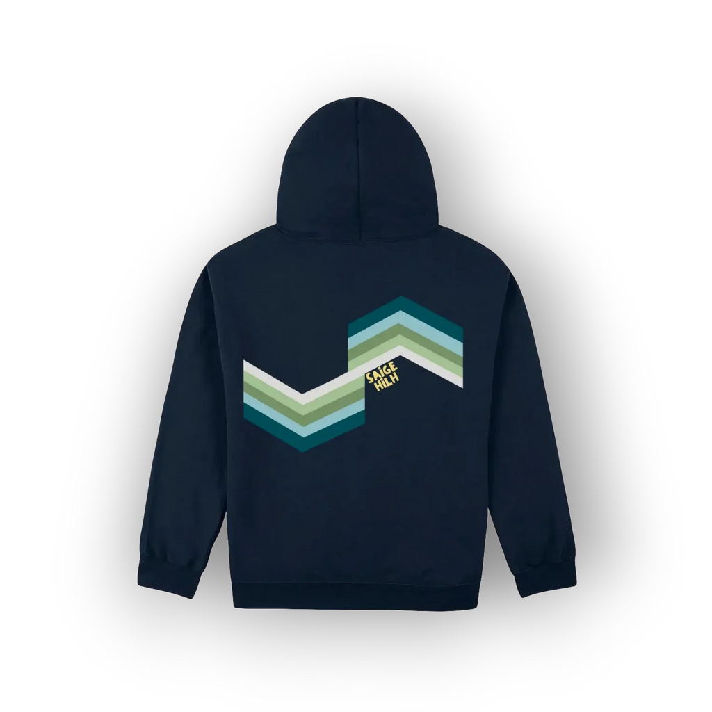 A navy blue hoodie shown from the back, featuring an original artist designed large chevron graphic in shades of teal, green, and white, with a small yellow 'SAIGE HILH' text overlay.