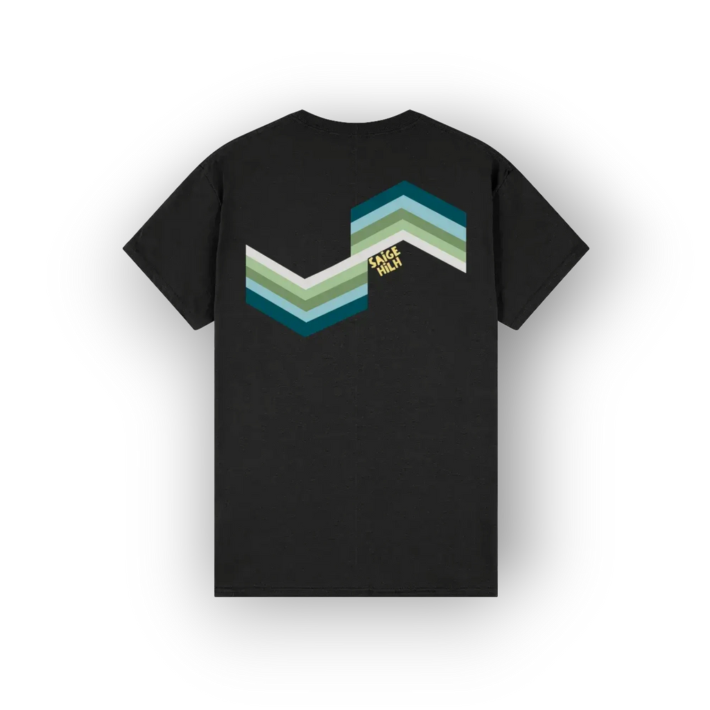 A black short-sleeve t-shirt shown from the back, featuring a retro chevron graphic in shades of teal, green, and white, with a small yellow 'SAIGE HILH' logo printed on the center.