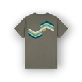 An olive green short-sleeve t-shirt shown from the back, featuring a large chevron graphic in shades of teal, blue, green, and white, with a small yellow 'SAIGE HILH' logo.