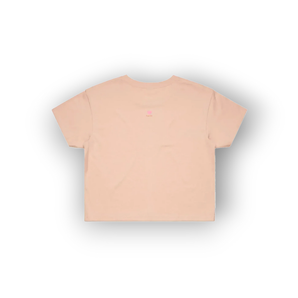 A light peach-pink short-sleeve t-shirt shown from the back, centered on a white background with a soft drop shadow.
