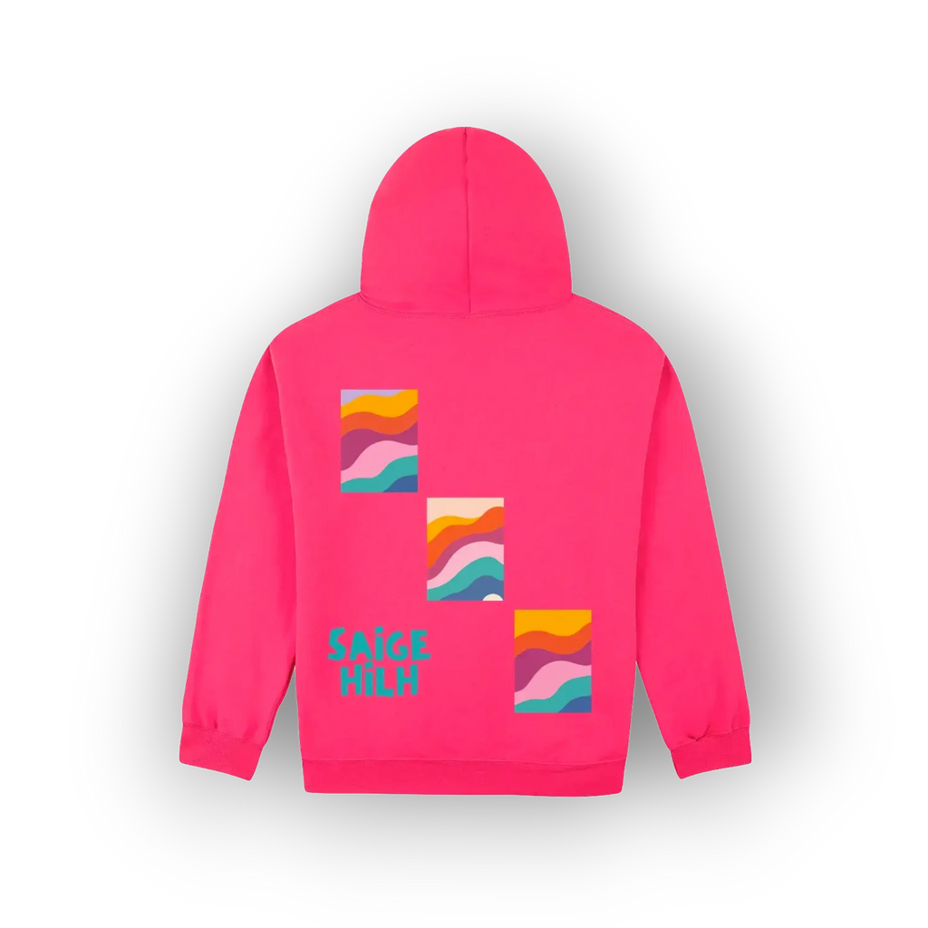 A bright pink hoodie shown from the back, featuring three colourful retro wavy stripe graphic squares and the text 'SAIGE HILH' in teal, set against a clean white background with a soft drop shadow.
